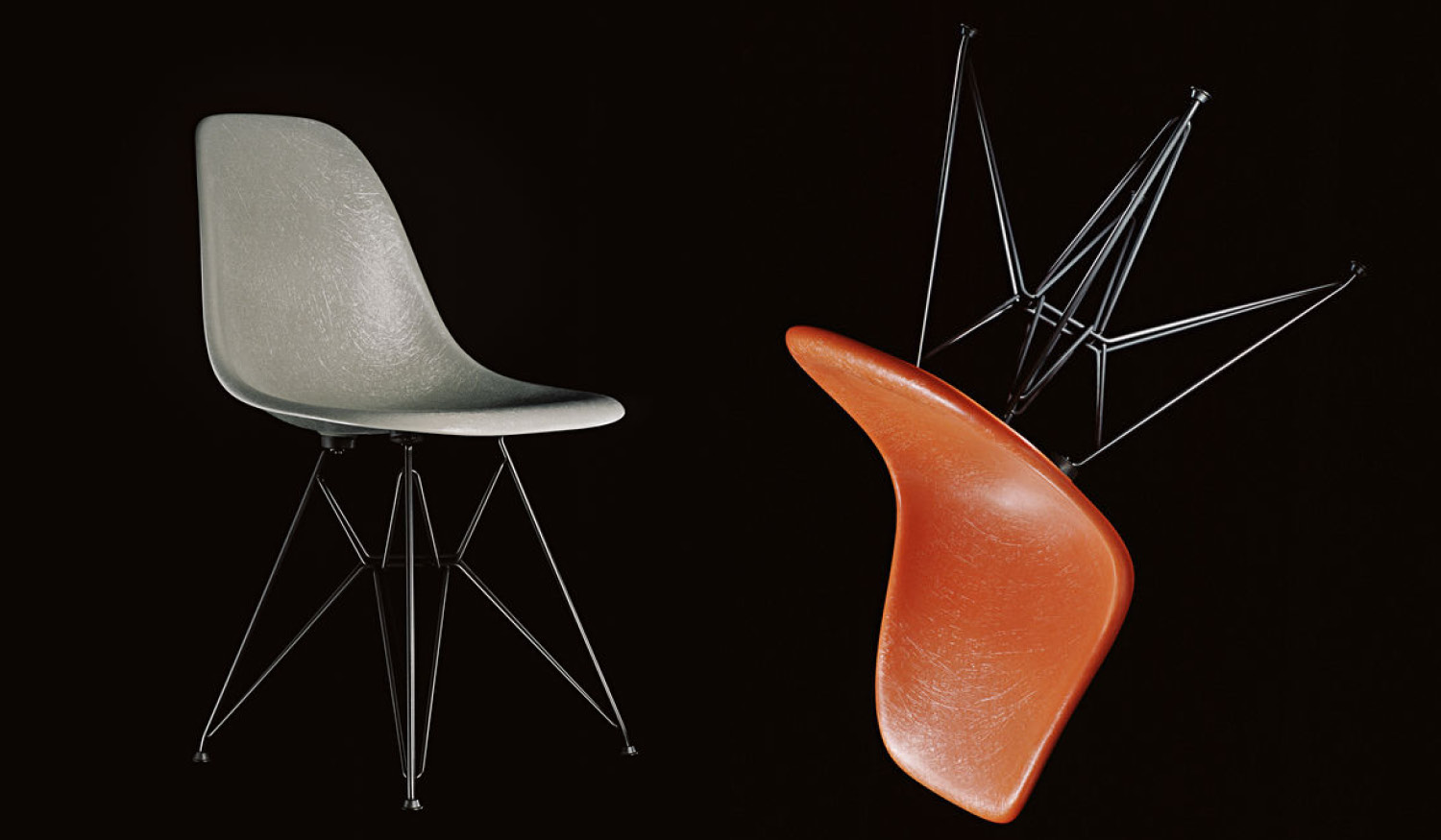 Eames Fiberglass stol i oransje og grått fra Vitra