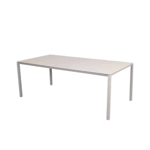 Pure spisebord med understell i sand og betongplate I toscana fra Cane-Line