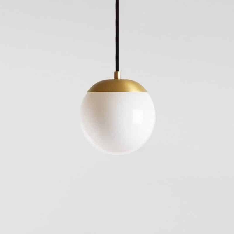 not just another dome I opal hvit med messing oppheng fra house of Holmedal