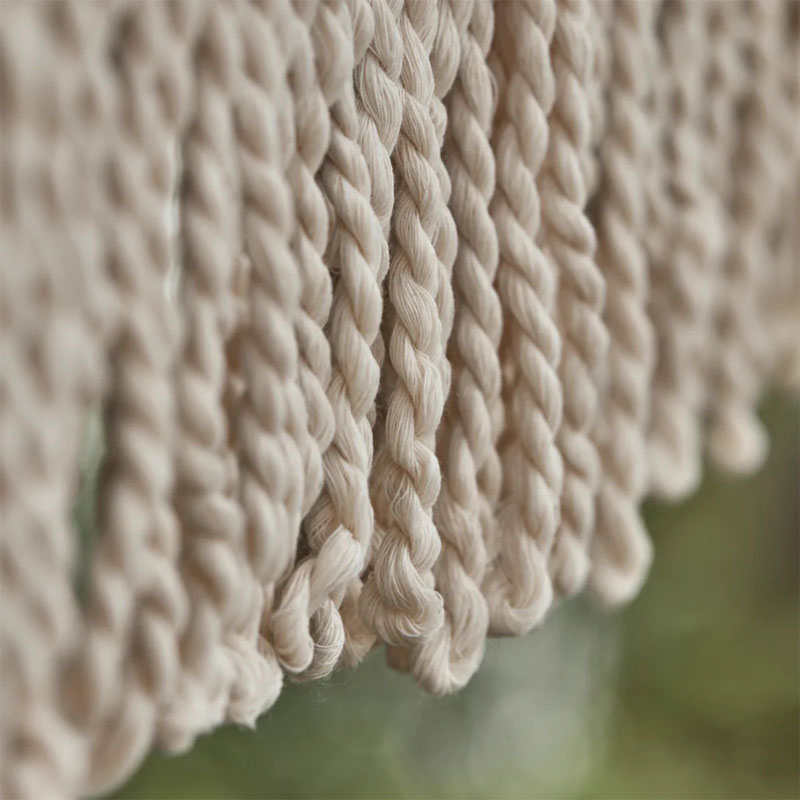 garden parasoll I grønn og off white med frynser fra house doctor