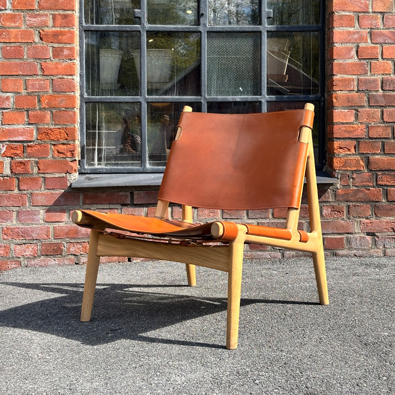 Hunter lenestol i oljet eik med cognac skinn fra eikund